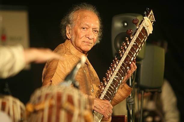 NEW DELHI, INDIA - DECEMBER 5: Sitar maestro Pandit Ravi Shankar performs in New Delhi on Saturday, December 5, 2009. (Photo by Kaushik Roy/The India Today Group via Getty Images)